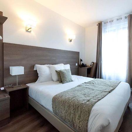 Hotel Le Theatre Suresnes Esterno foto