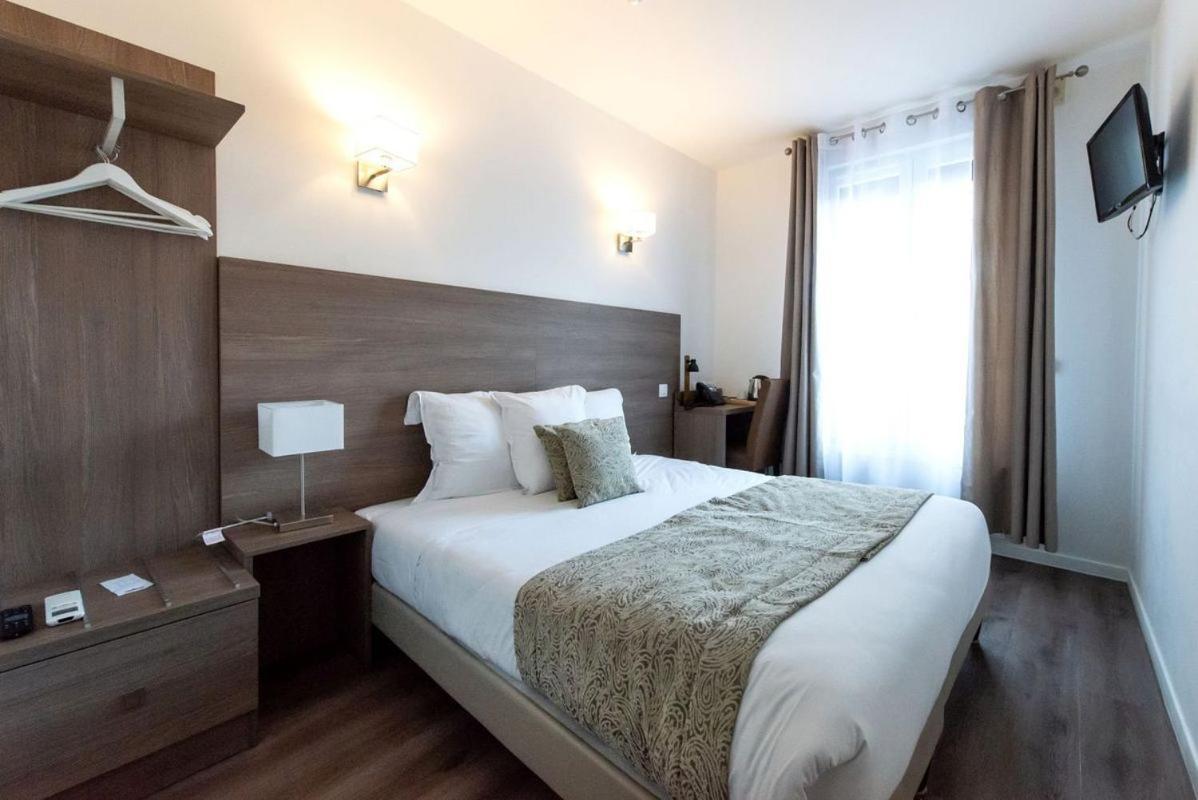 Hotel Le Theatre Suresnes Esterno foto
