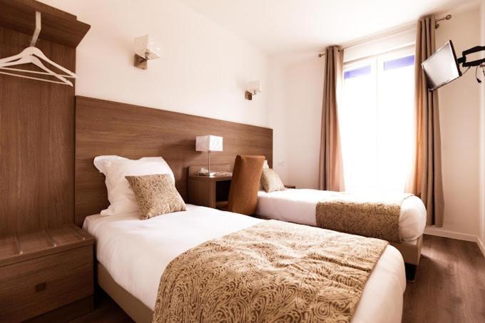 Hotel Le Theatre Suresnes Esterno foto
